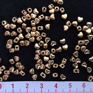 Mellemled små hjerte perler - guld
